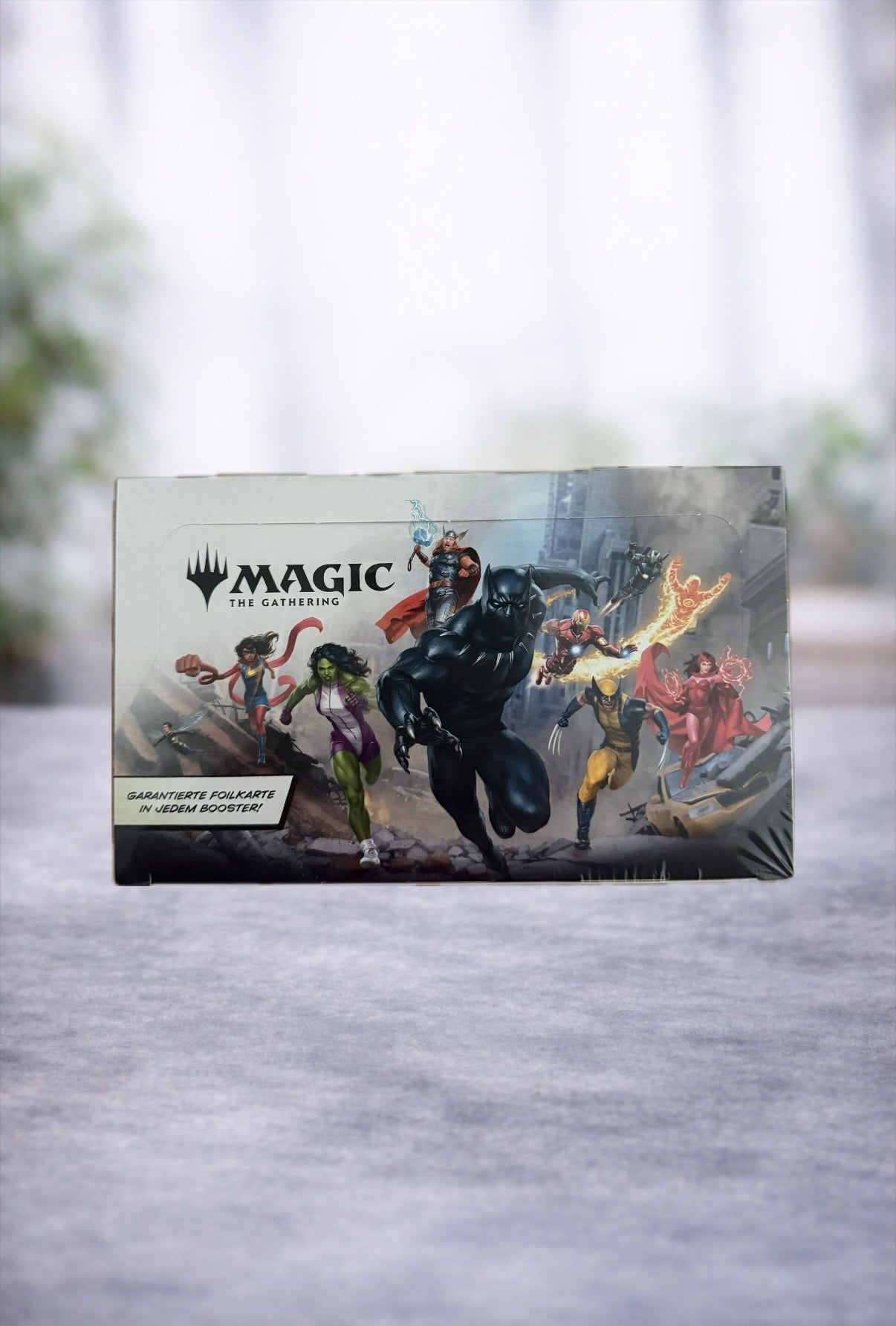 Magic: The Gathering - Marvel Super Heroes- Play Booster Display (DE)